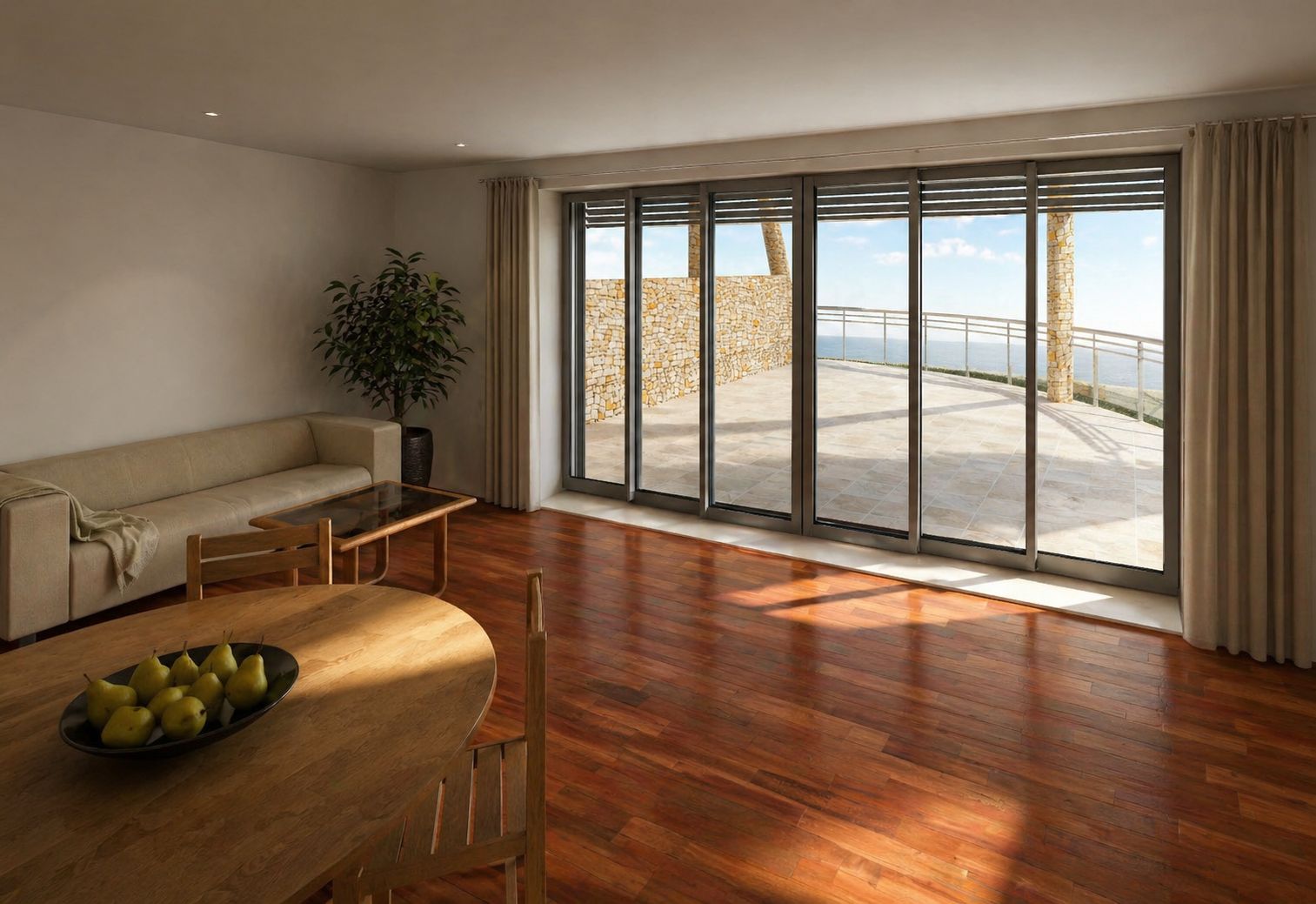 Séjour d'un logement, baie vitrée toute hauteur ouverte sur la terrasse